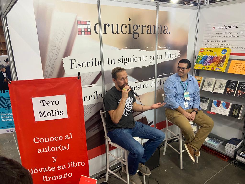 Tero Moliis presenting at a book fair